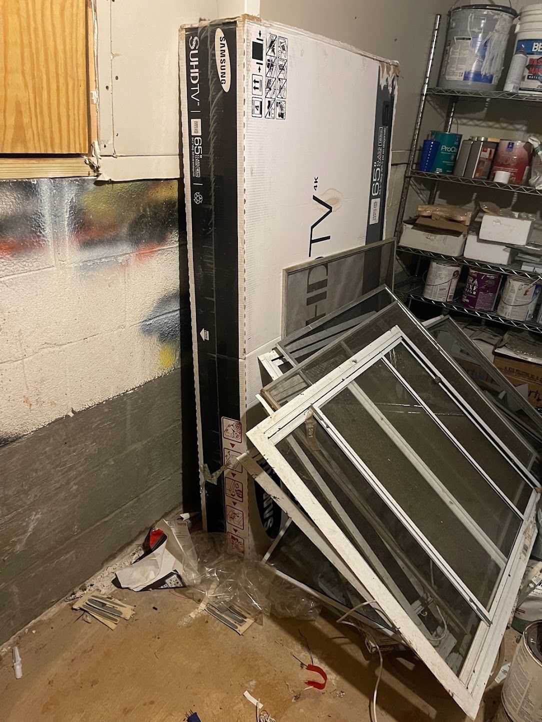 Basement debris and old windows ready for removal