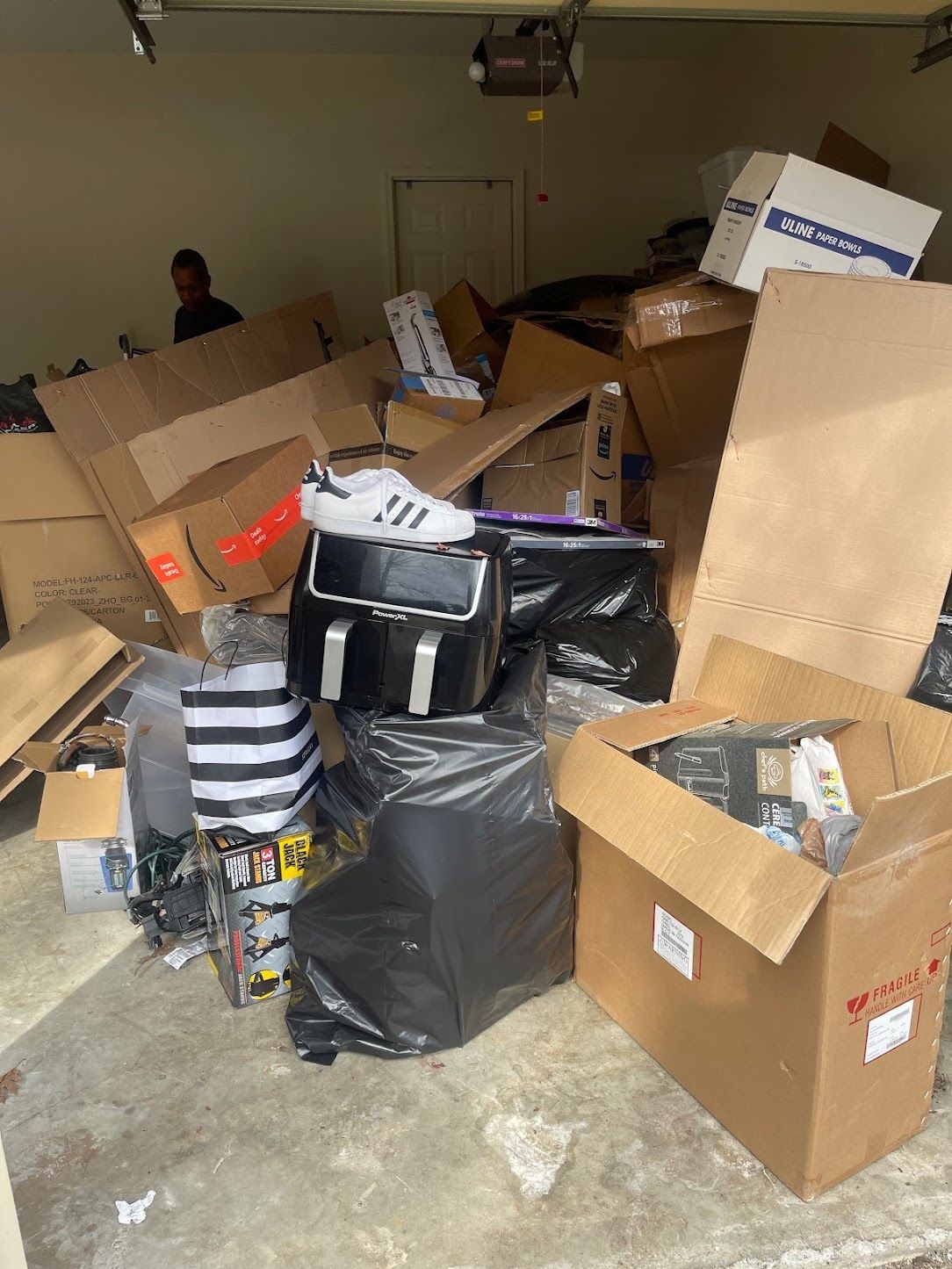 Before: Garage cleanout, boxes and bags, Wakanda Junk Removal job in metro Atlanta